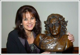 Laura with John Lennon sculpture